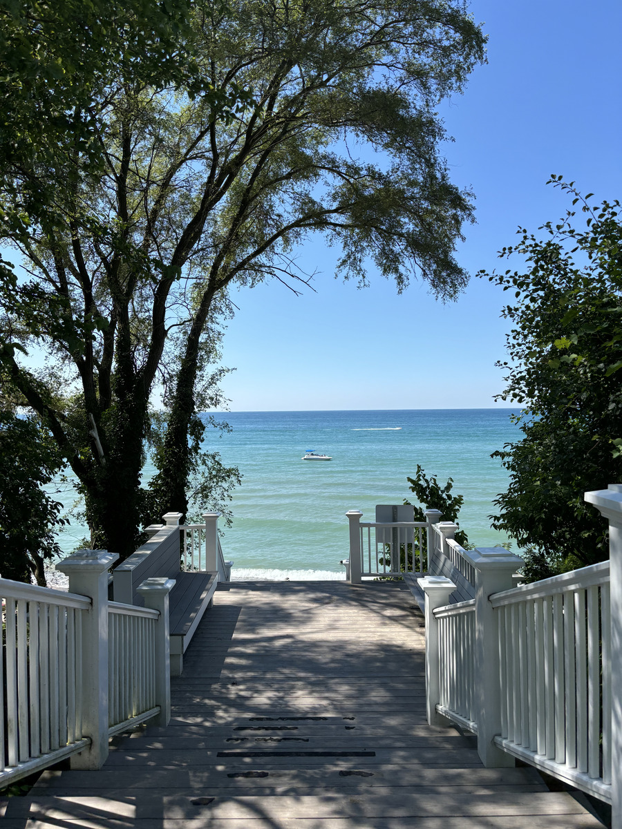 A view of Lake Michigan down a nice boardwalk on waterfront property